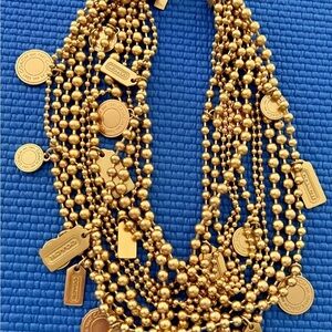 Coach Gold-Tone Layered Beaded Charm Necklace